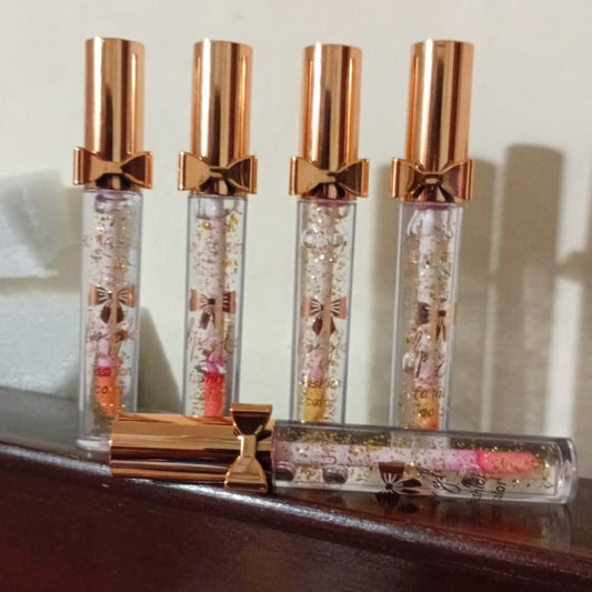 Luxury Pink Glossy Lip Oil With Gold Flakes High Shine Moisturizing Formula Pic 1