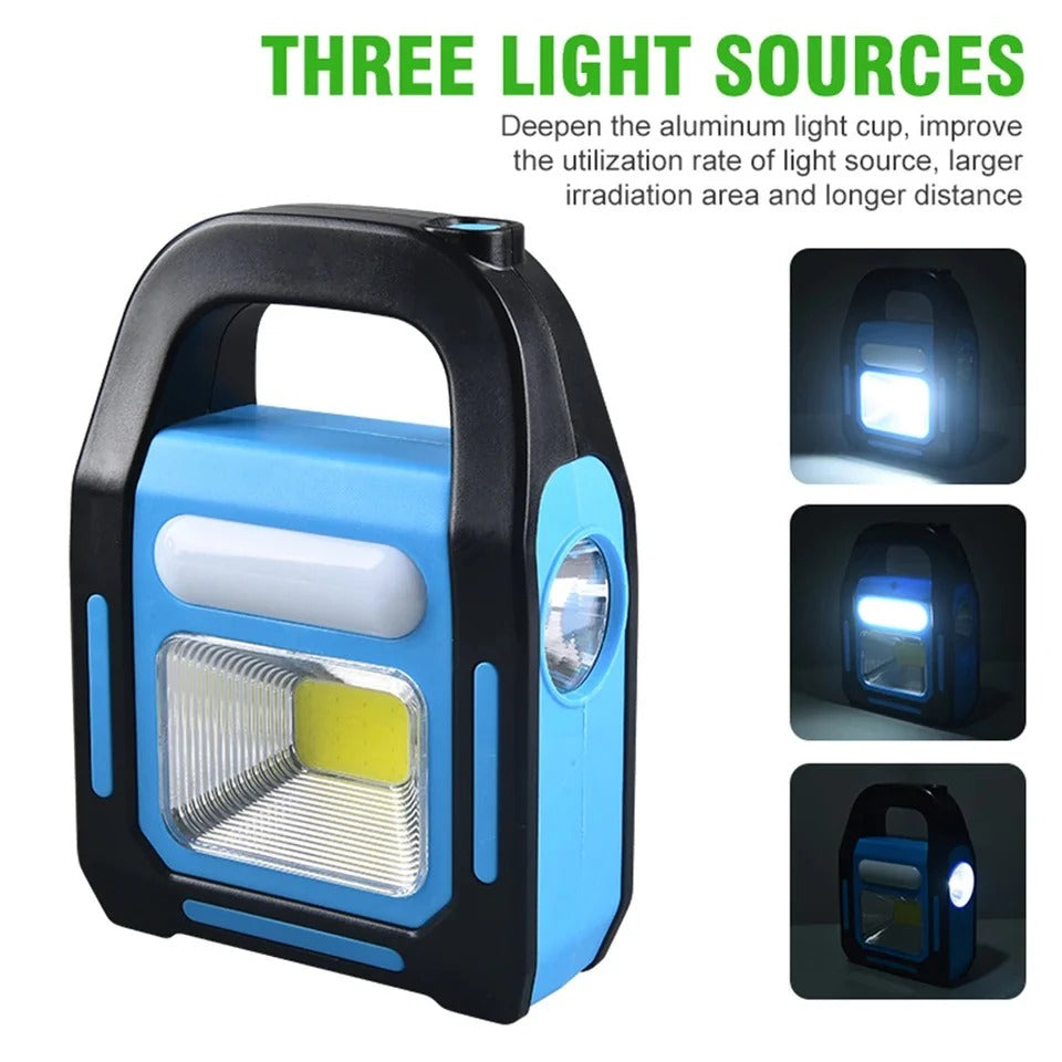 Portable LED work lamp with three light sources for outdoor and garage use