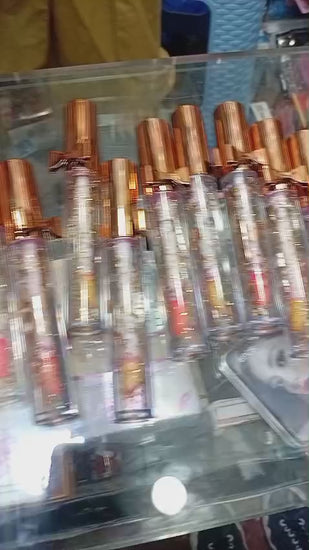 Luxury Pink Glossy Lip Oil With Gold Flakes High Shine Moisturizing Formula Video